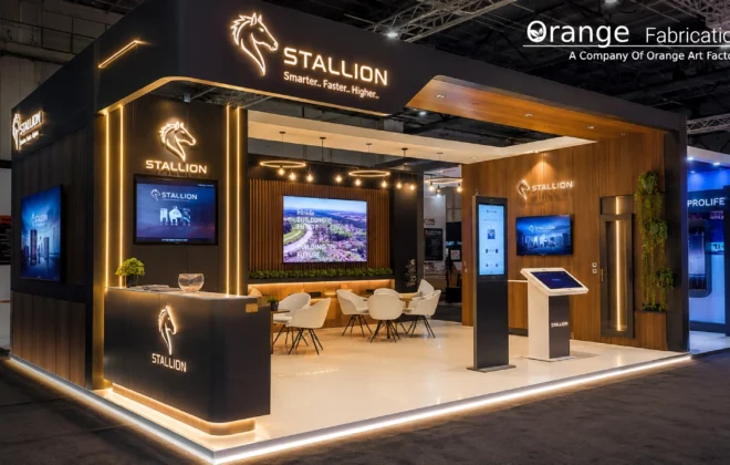 Custom modern trade show booth designed by a professional exhibition stall fabricator in Hyderabad with raised flooring and LED lighting