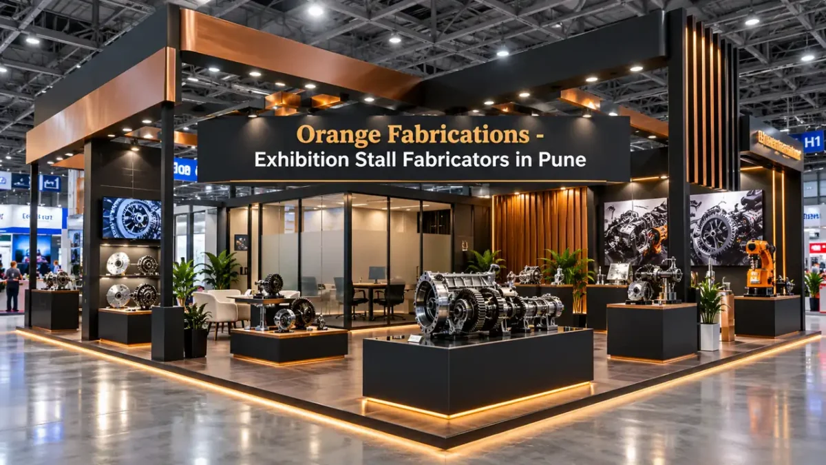 Exhibition stall fabricators in Pune constructing custom booth with heavy machinery platforms and VIP lounge at Auto Cluster Chinchwad
